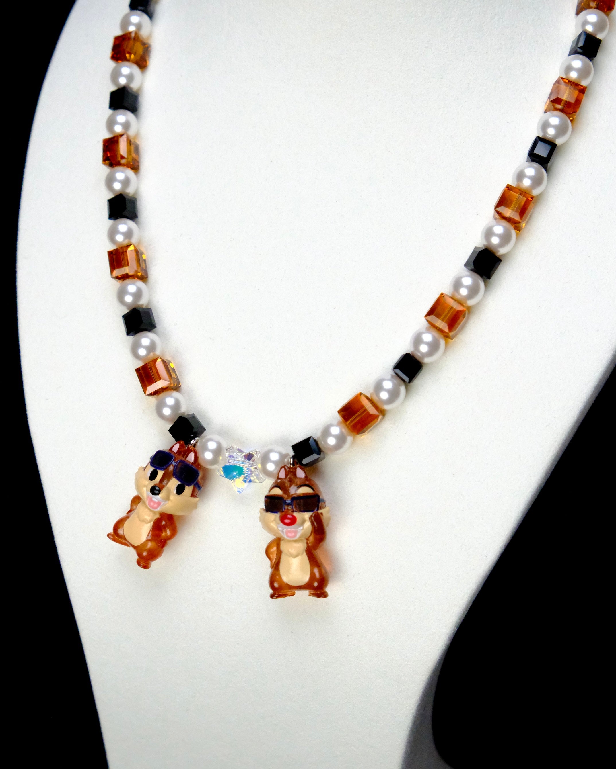 Detail product photo of Retro Sparkle Charm Necklace by Shinora Studio.