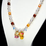 Detail product photo of Hawaiian Dream Duo Necklace by Shinora Studio.