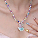 Side profile view of Shell & Pearl Necklace · handmade Swarovski crystal jewelry