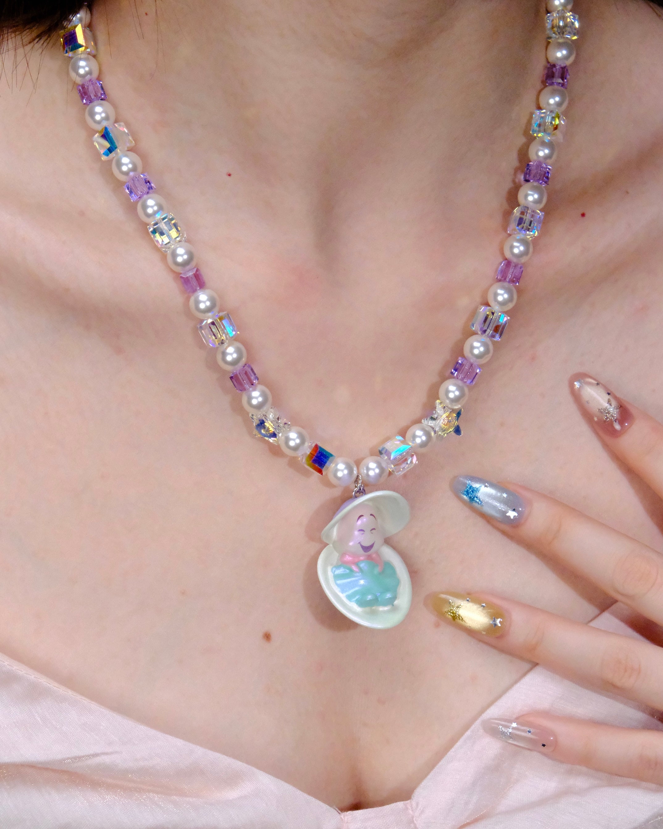 Side profile view of Shell & Pearl Necklace · handmade Swarovski crystal jewelry