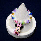Pulsera Swarovski con colgante de ratón con lazo rosa