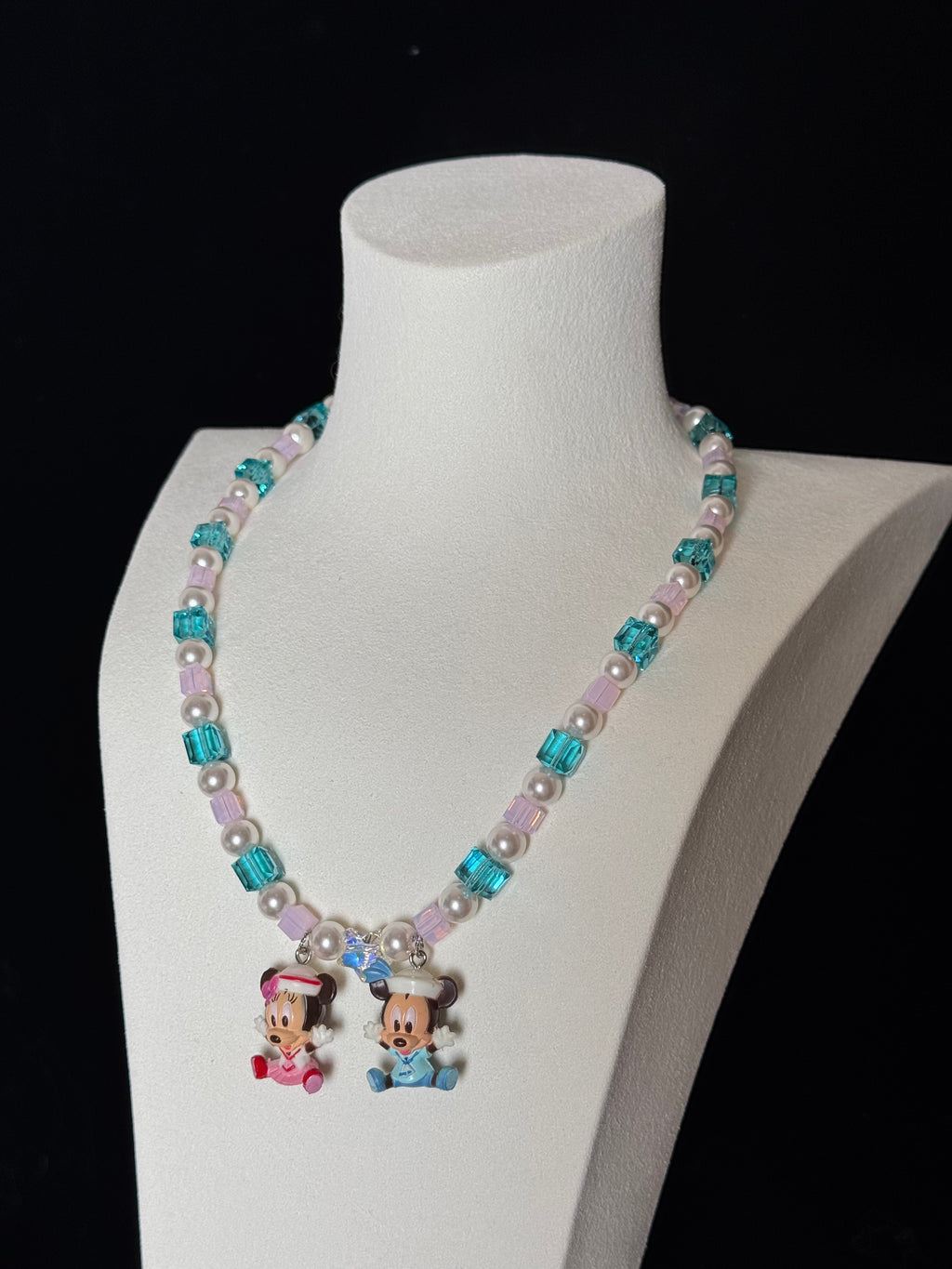 ShinoraStudio Pastel Duo Mouse Swarovski Necklace with pastel-colored stones and delicate chain, elegant jewelry accessory.