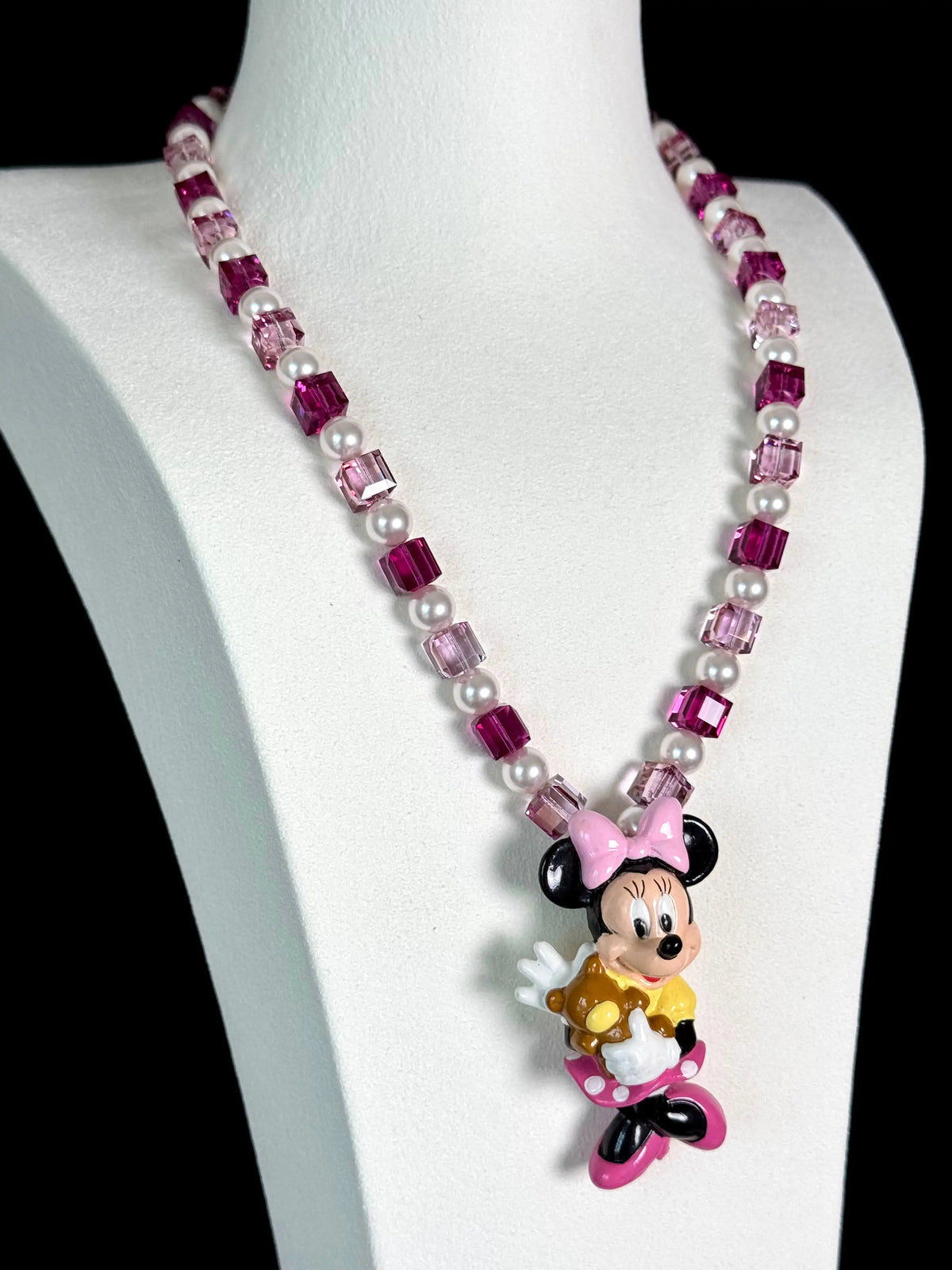 Model wearing handmade pink and purple crystal charm necklace with Swarovski beads and pearls