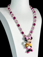 Model wearing handmade pink and purple crystal charm necklace with Swarovski beads and pearls