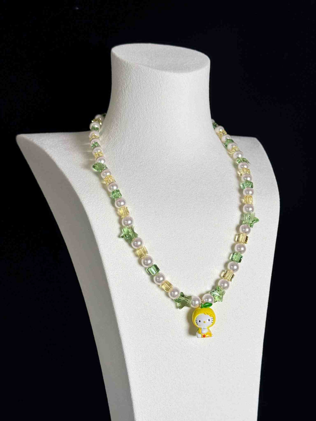 Handmade crystal charm necklace clasp detail - gold-tone lobster clasp with Swarovski pearl accents