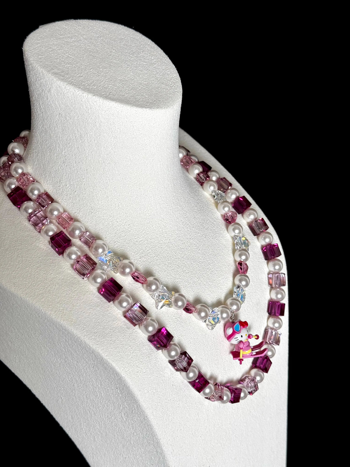 Double-layer design close-up on handmade pink Swarovski crystal charm necklace by ShinoraStudio