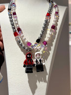 Pastel Web Girl Swarovski Necklace by ShinoraStudio featuring delicate pink and blue gemstone accents and intricate web-inspired design.