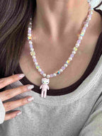 Vintage charm pendant on handmade iridescent Swarovski crystal and pearl necklace - unique beaded jewelry