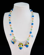 Yellow crystal charm necklace with Swarovski pearls and three vintage charms - handmade beaded jewelry