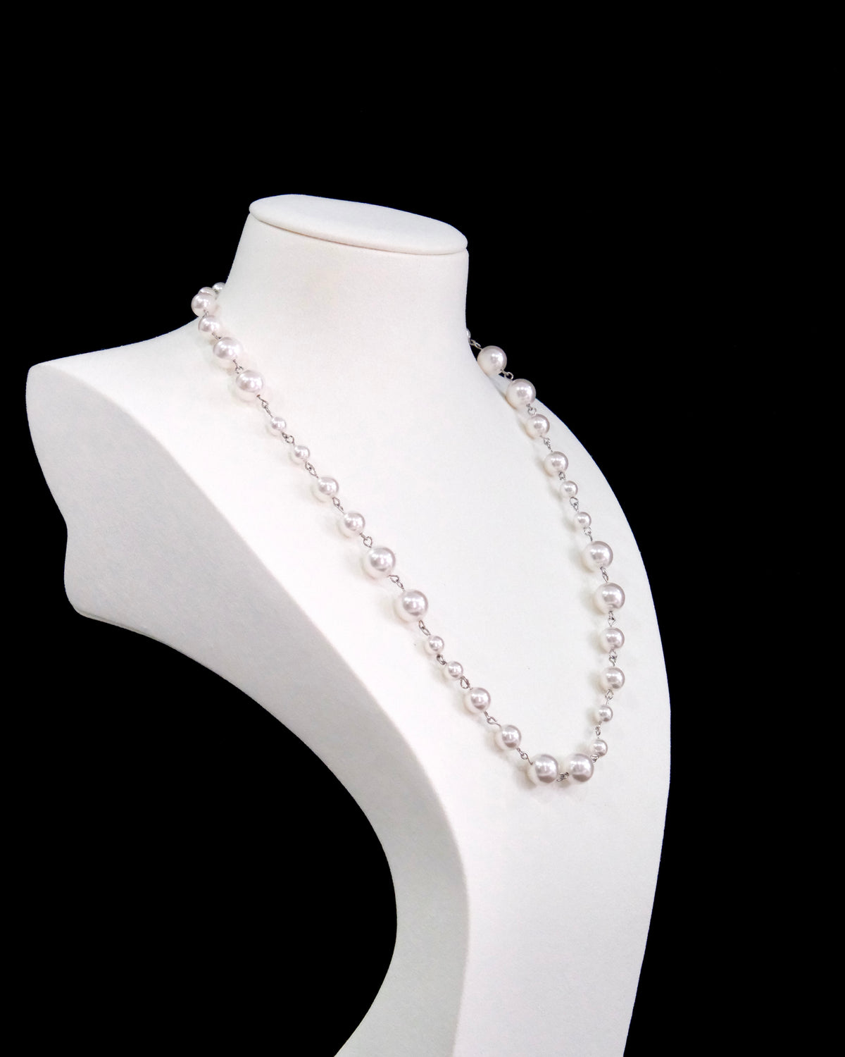 Swarovski pearls close-up on handmade petite pearl necklace by ShinoraStudio