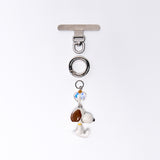 Product photo showing Vintage dog-inspired phone charm with a Swarovski crystal heart and silver-tone phone hardware.