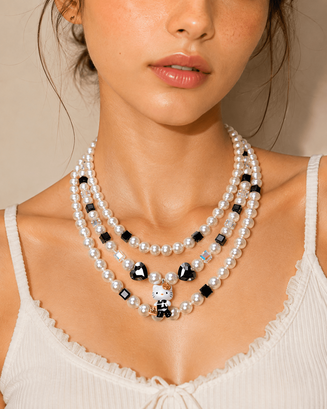 Product photo of Monochrome Pearl Triple Layer Necklace by Shinora Studio.