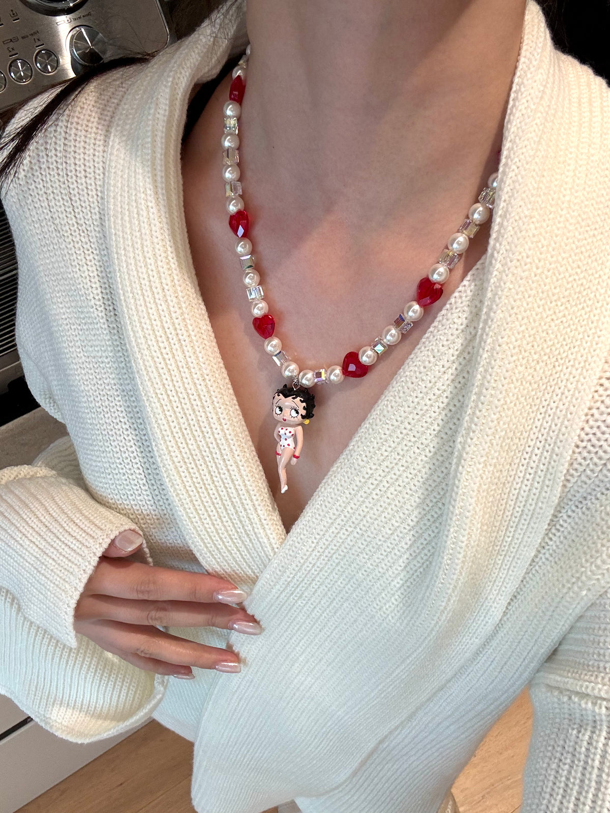 Model wearing vintage Betty Boop charm Swarovski necklace - handmade white and red beaded jewelry