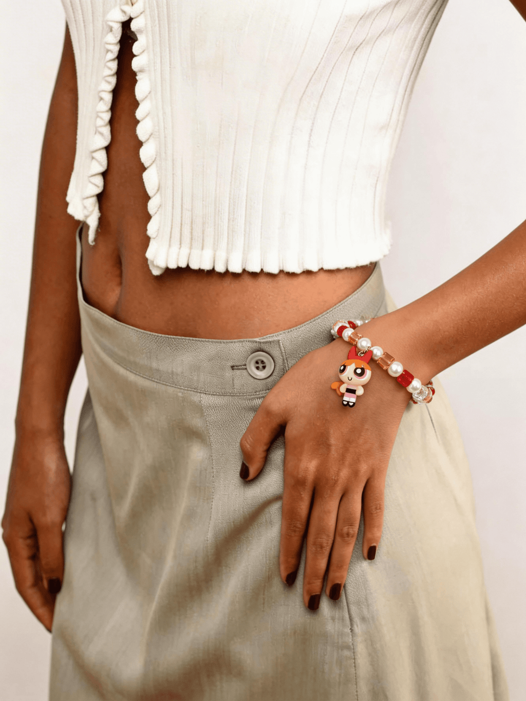 Model wearing vintage Blossom Powerpuff Girls charm bracelet with Swarovski crystals by ShinoraStudio
