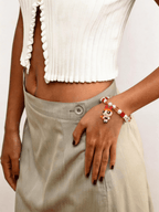 Model wearing vintage Blossom Powerpuff Girls charm bracelet with Swarovski crystals by ShinoraStudio