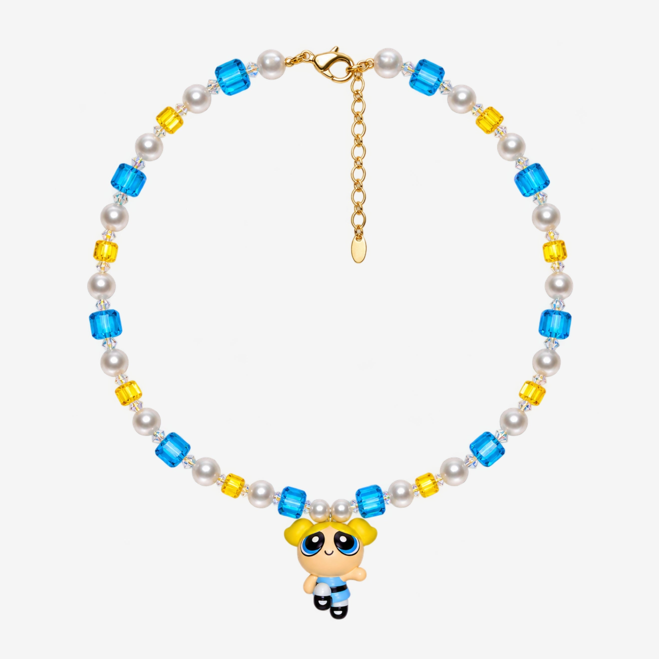Necklace with blue and yellow Swarovski crystals, white crystal pearls and a blonde girl charm with pigtails and a blue dress.
