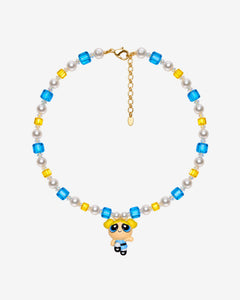 Necklace with blue and yellow Swarovski crystals, white crystal pearls and a blonde girl charm with pigtails and a blue dress.