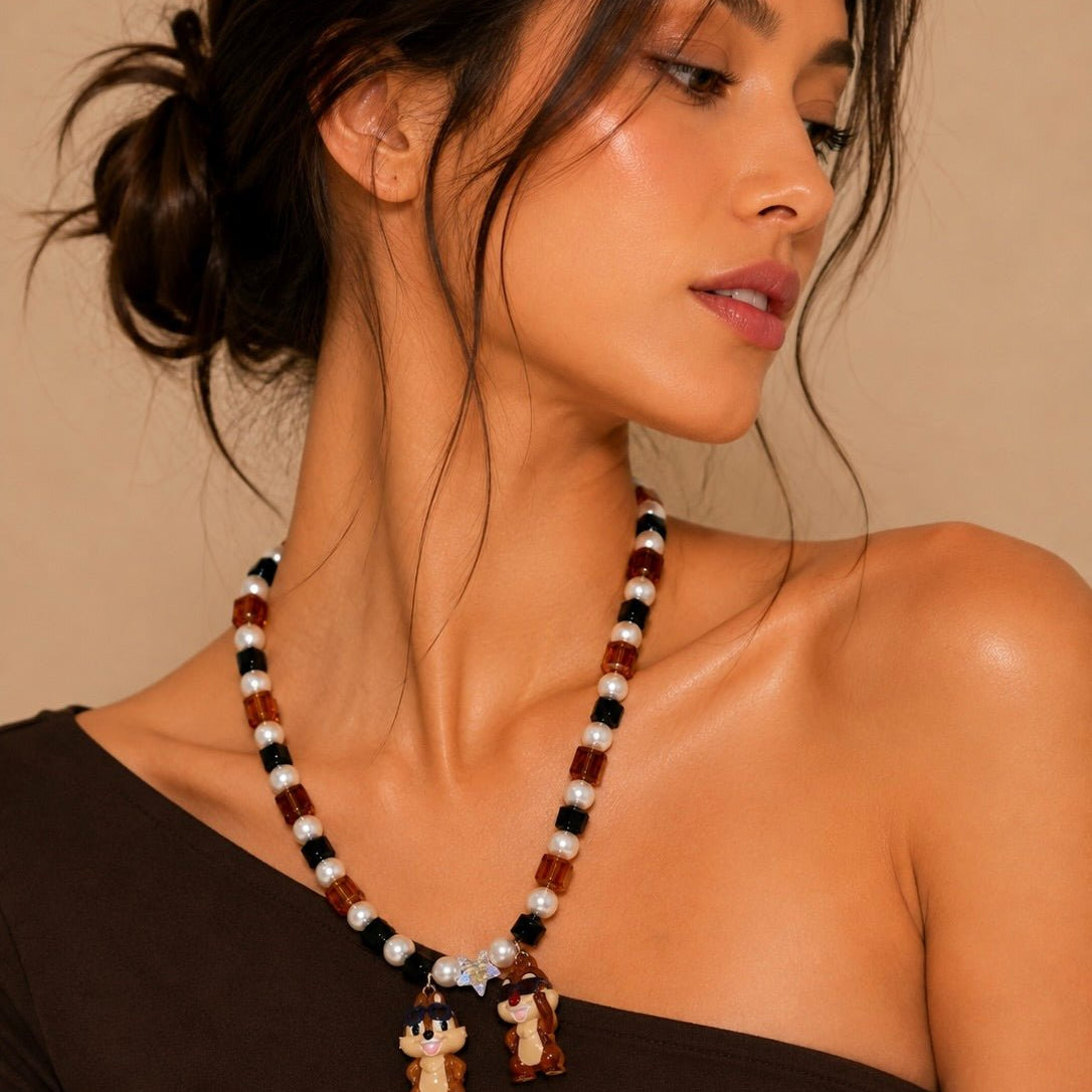 Product photo of Retro Sparkle Charm Necklace by Shinora Studio.