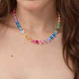 Rainbow Prism Crystal Choker with multicolored faceted beads, worn around the neck above a red top.