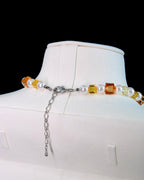 Swarovski pearl heart beads close-up on handmade crystal charm necklace - unique beaded jewelry