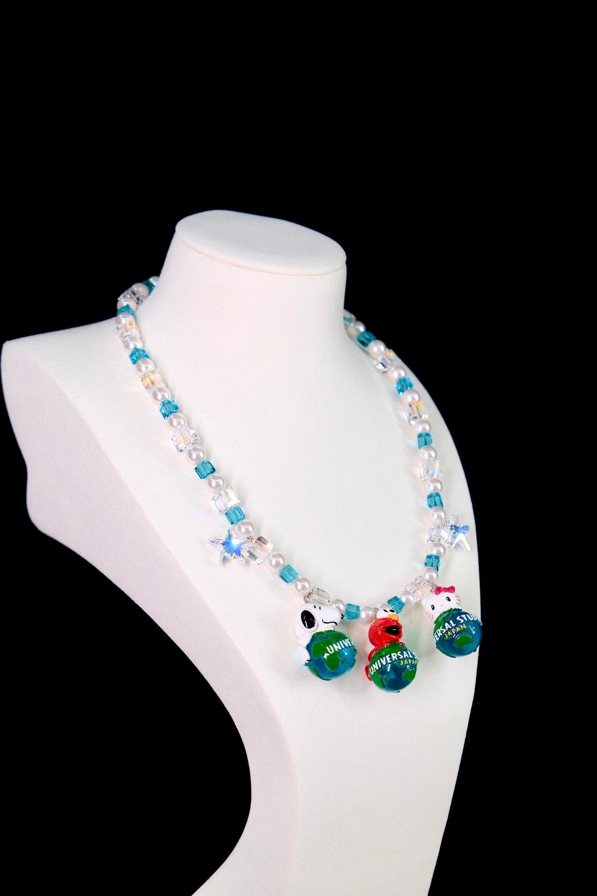 ShinoraStudio handmade charm necklace on bust - vintage pendants with Swarovski crystals and pearls