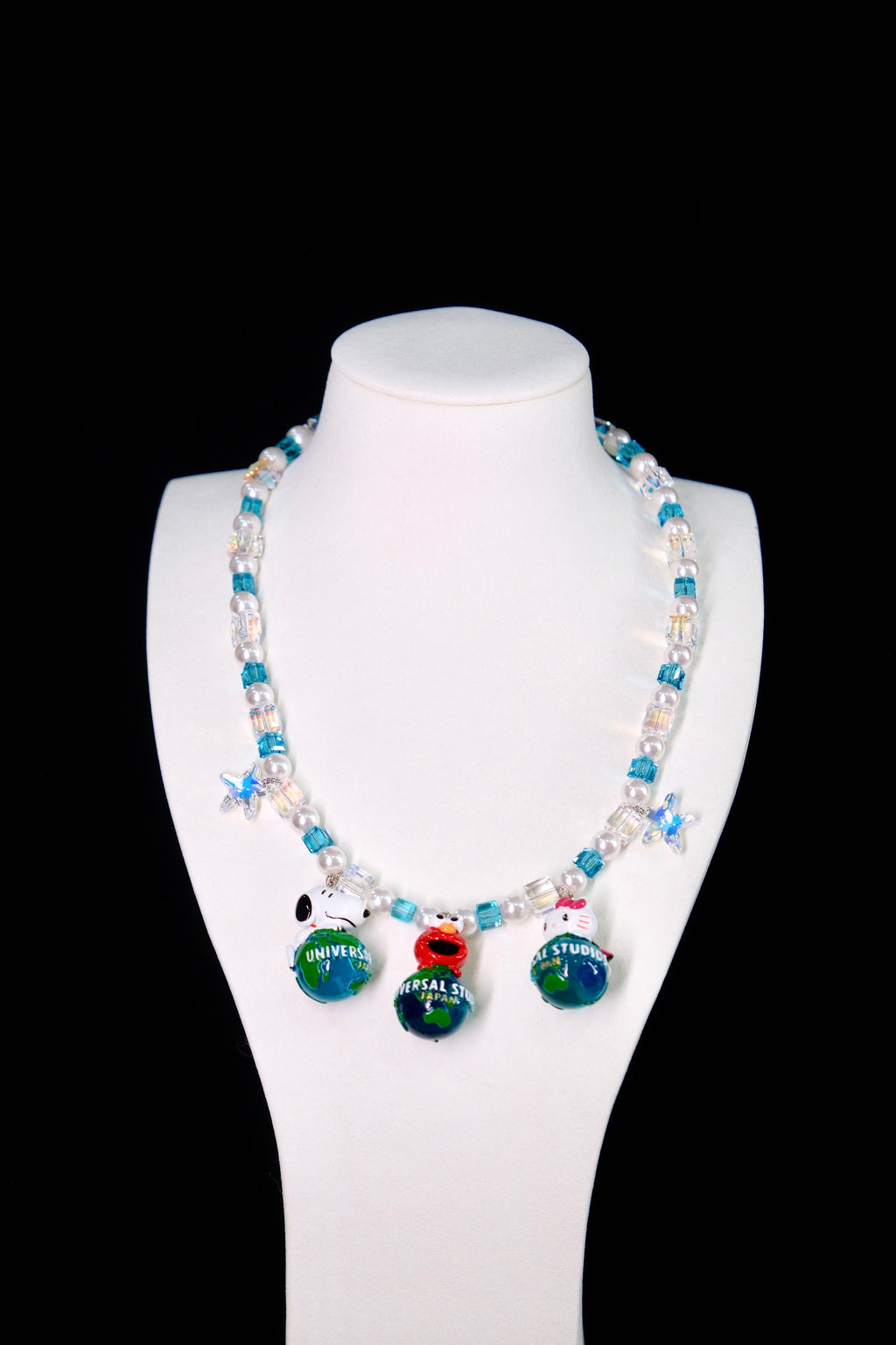 Vintage charm Swarovski crystal necklace on display bust - sky-blue and iridescent AB beads with pearl accents
