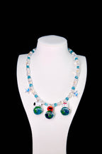 Vintage charm Swarovski crystal necklace on display bust - sky-blue and iridescent AB beads with pearl accents