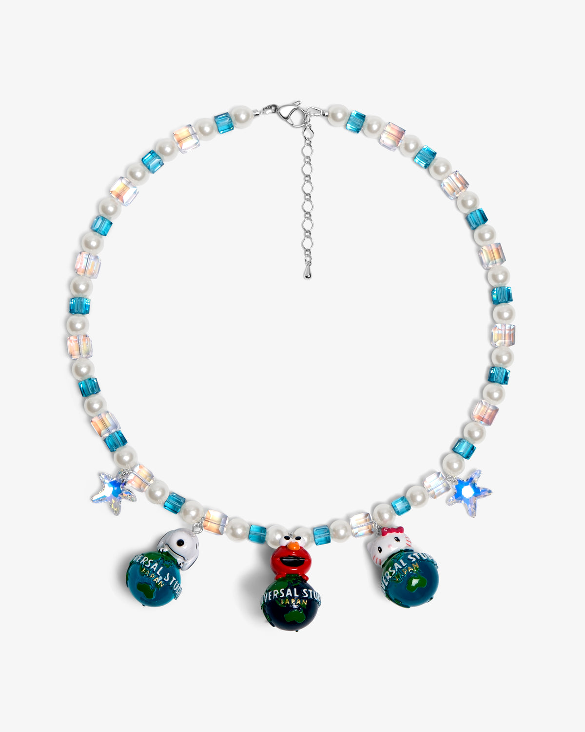 Handmade vintage charm Swarovski necklace with sky-blue crystals, iridescent AB beads and white pearls - flat lay