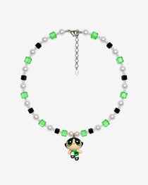 Necklace with green and black Swarovski crystals, white crystal pearls and a green-eyed girl charm wearing a green dress.