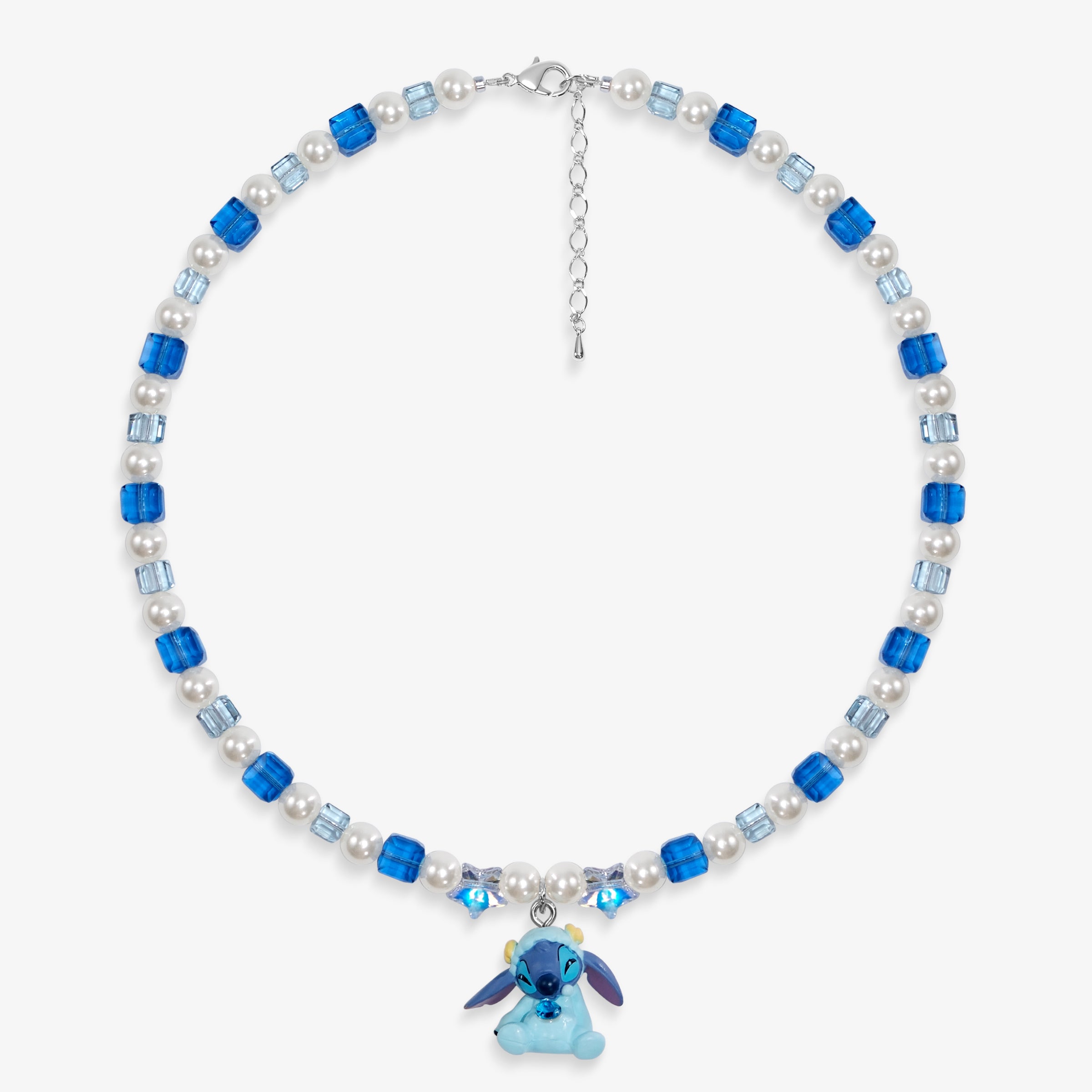 Close-up of a handmade blue Swarovski crystal charm necklace with crystals, pearls and cosmic-inspired collectible charm details