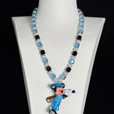 Display view of a handmade blue Swarovski crystal charm necklace with crystals, pearls and sport-inspired collectible charm details