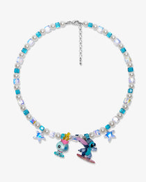 Flat lay of a handmade blue Swarovski crystal charm necklace with crystals, pearls and surf-inspired collectible charm details