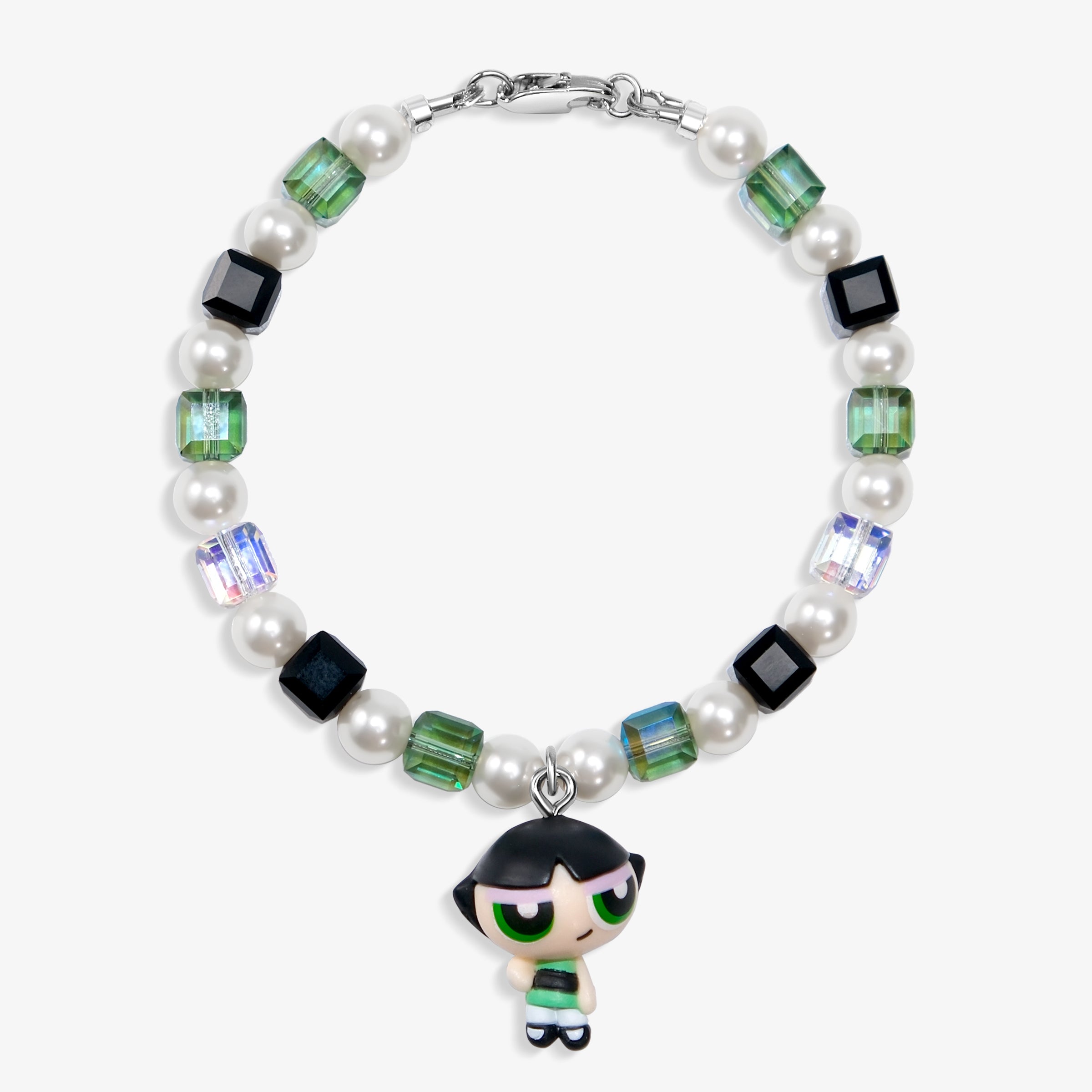 Close-up of a handmade green Swarovski crystal charm bracelet with crystals, pearls and nostalgic vintage-inspired collectible charm details