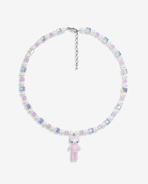 Close-up of a handmade iridescent Swarovski crystal charm necklace with crystals, pearls and sport-inspired collectible charm details