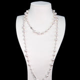 Close-up of a handmade Swarovski crystal and pearl necklace with crystals, pearls and clean pearl styling details