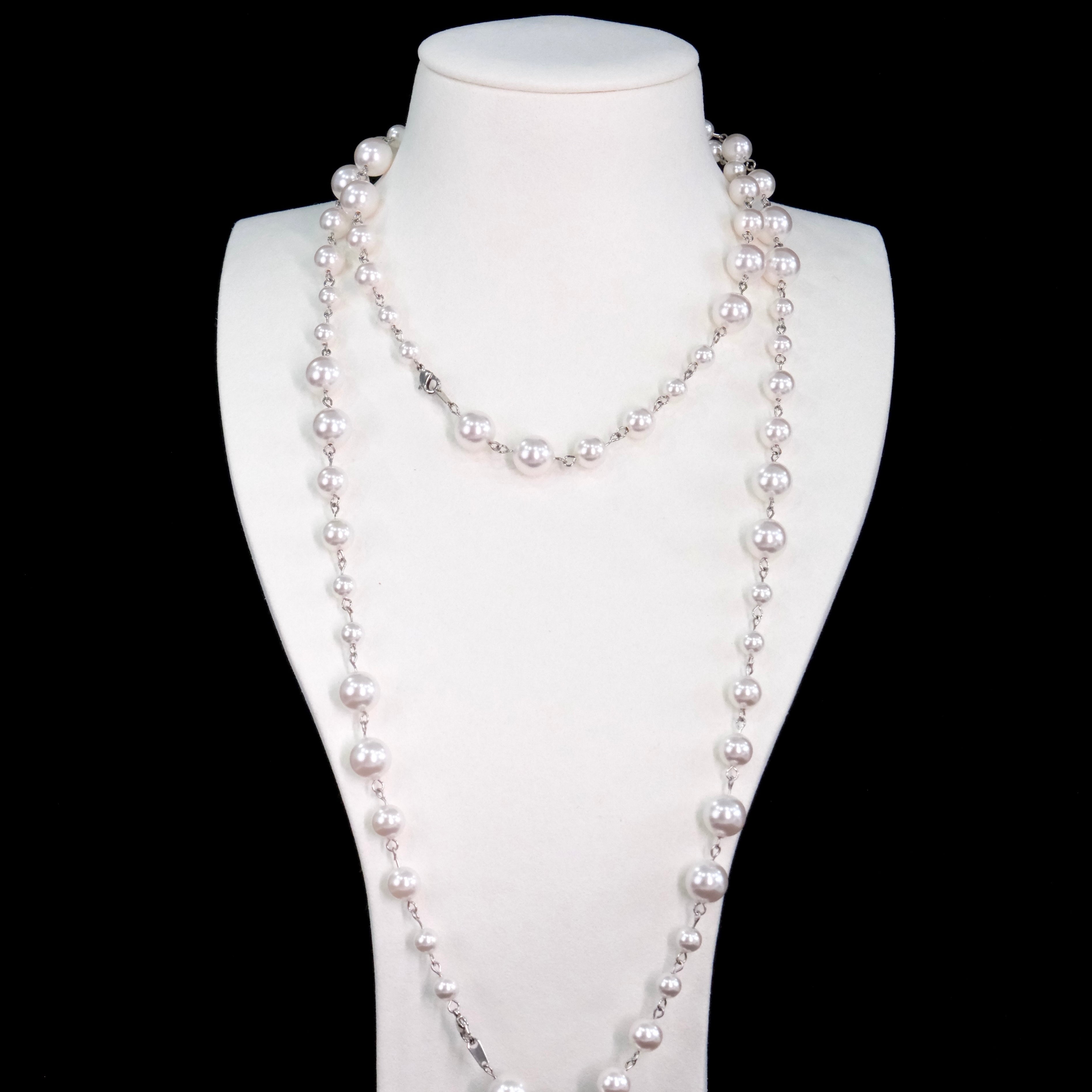 Close-up of a handmade Swarovski crystal and pearl necklace with crystals, pearls and clean pearl styling details