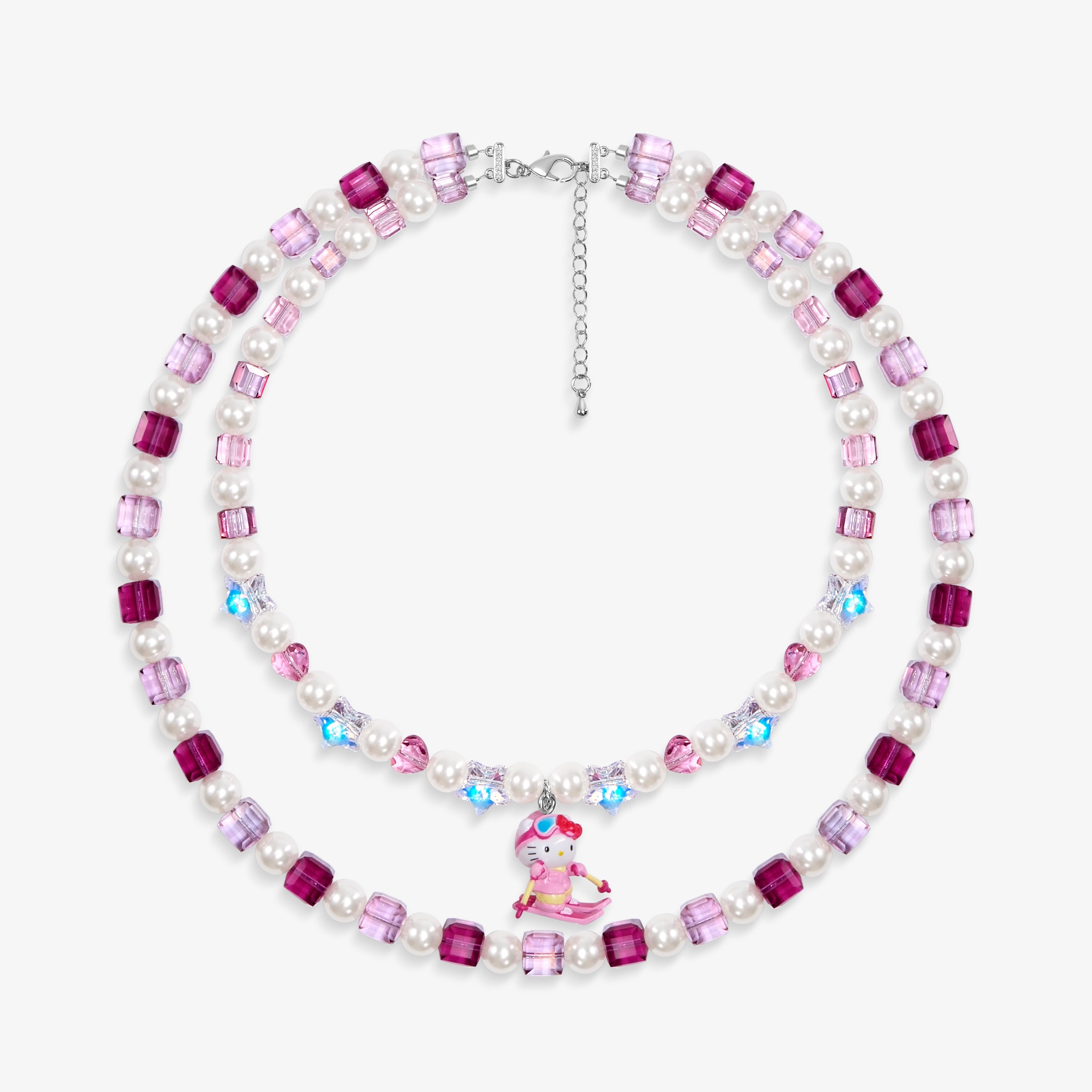 Close-up of a handmade pink Swarovski crystal charm necklace with crystals, pearls and ski-inspired collectible charm details
