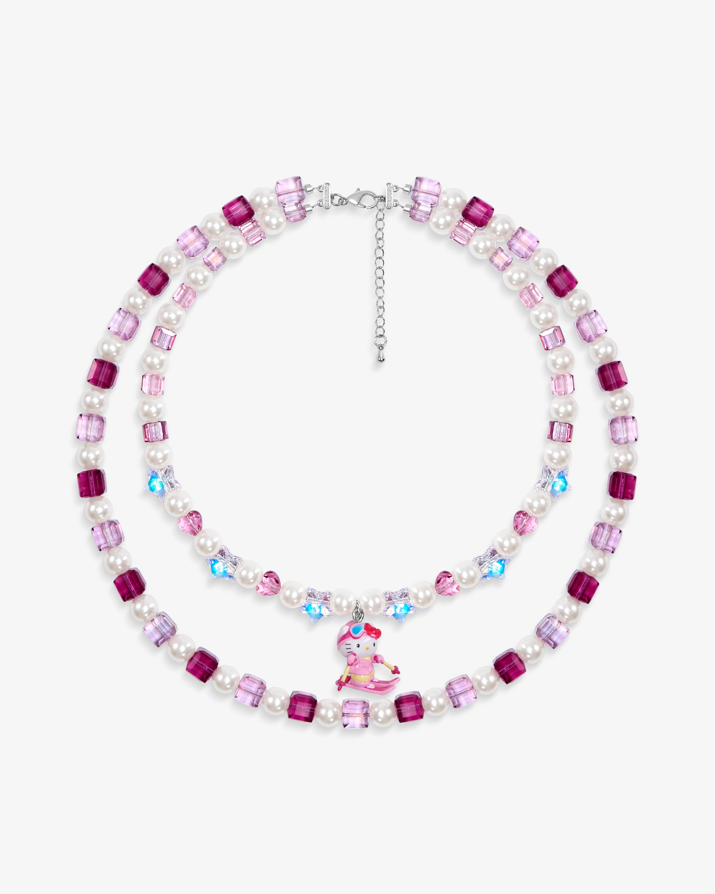 Close-up of a handmade pink Swarovski crystal charm necklace with crystals, pearls and ski-inspired collectible charm details