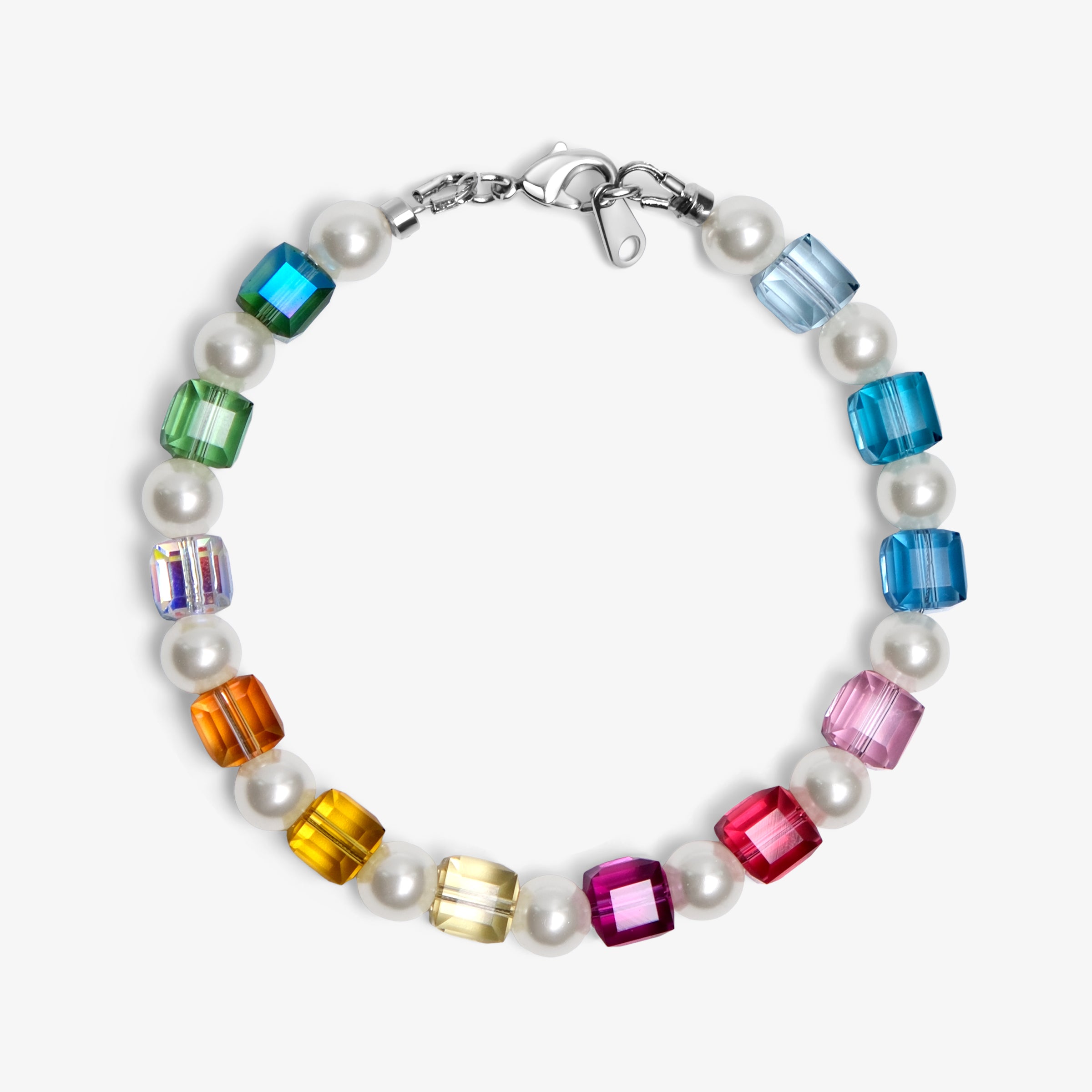 Close-up of a handmade rainbow Swarovski crystal charm bracelet with crystals, pearls and rainbow-inspired collectible charm details