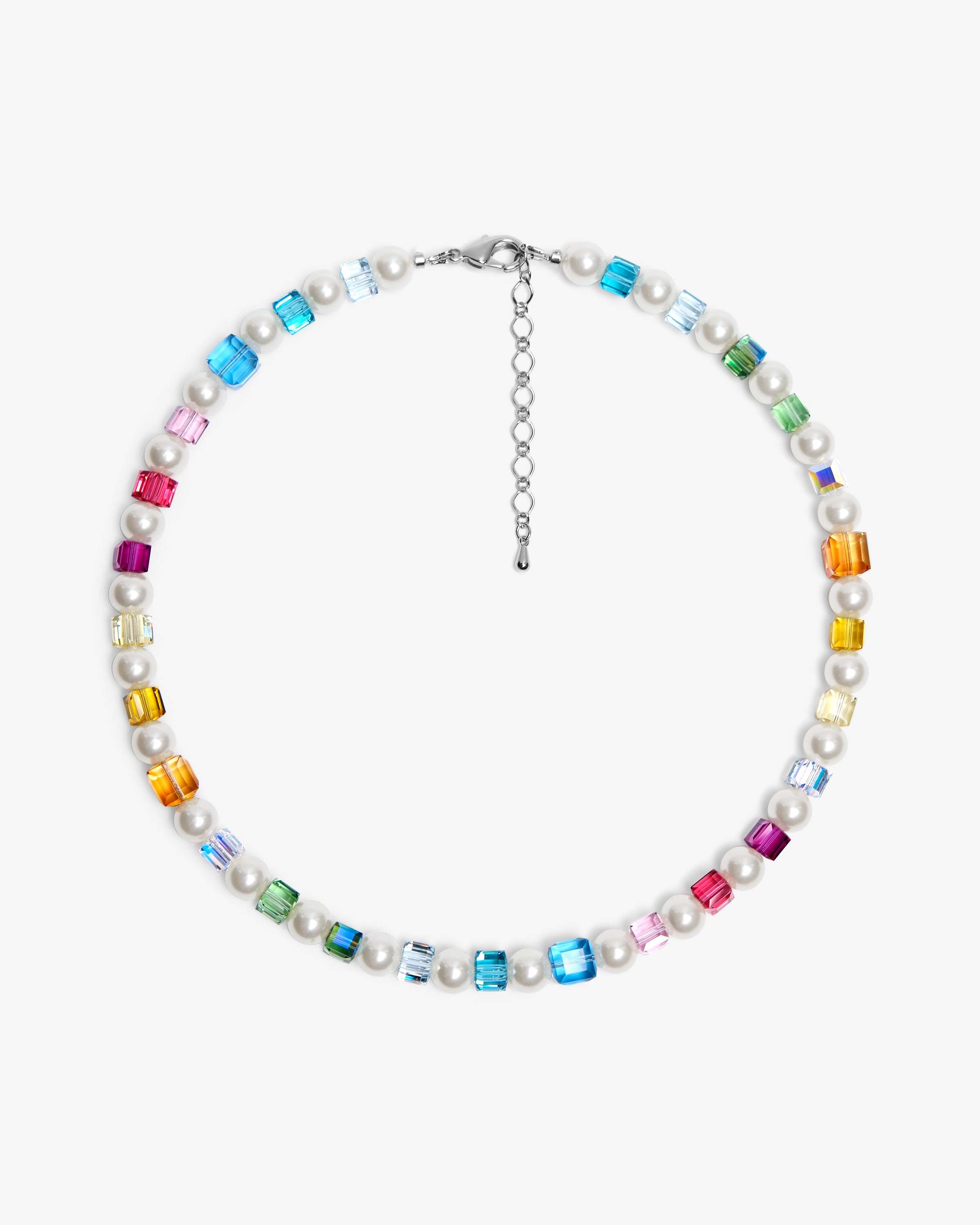 Close-up of a handmade rainbow Swarovski crystal charm necklace with crystals, pearls and rainbow-inspired collectible charm details