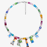 Flat lay of a handmade rainbow Swarovski crystal charm necklace with crystals, pearls and rainbow-inspired collectible charm details