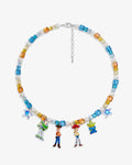 Flat lay of a handmade Swarovski crystal charm necklace with crystals, pearls and rainbow-inspired collectible charm details