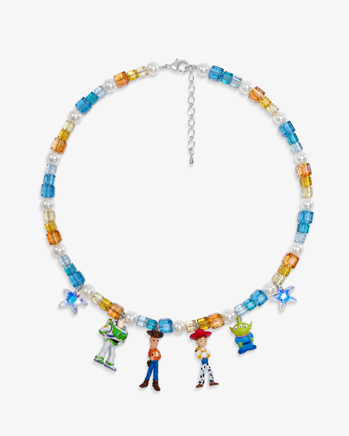 Flat lay of a handmade Swarovski crystal charm necklace with crystals, pearls and rainbow-inspired collectible charm details