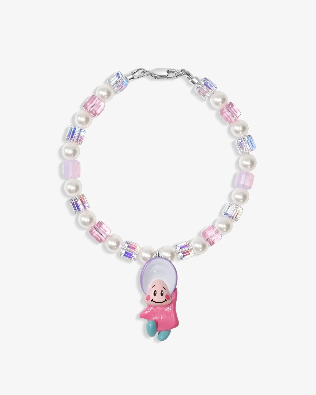 Close-up of a handmade Swarovski crystal charm bracelet with crystals, pearls and nostalgic vintage-inspired collectible charm details