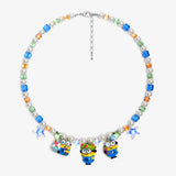 Close-up of a handmade Swarovski crystal charm necklace with crystals, pearls and garden-inspired collectible charm details