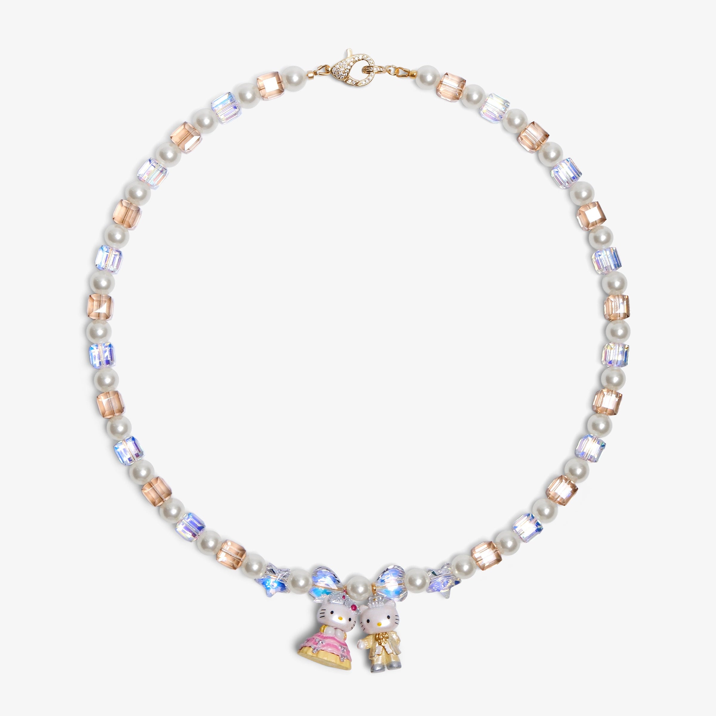 Close-up of a handmade Swarovski crystal charm necklace with crystals, pearls and princess-inspired collectible charm details