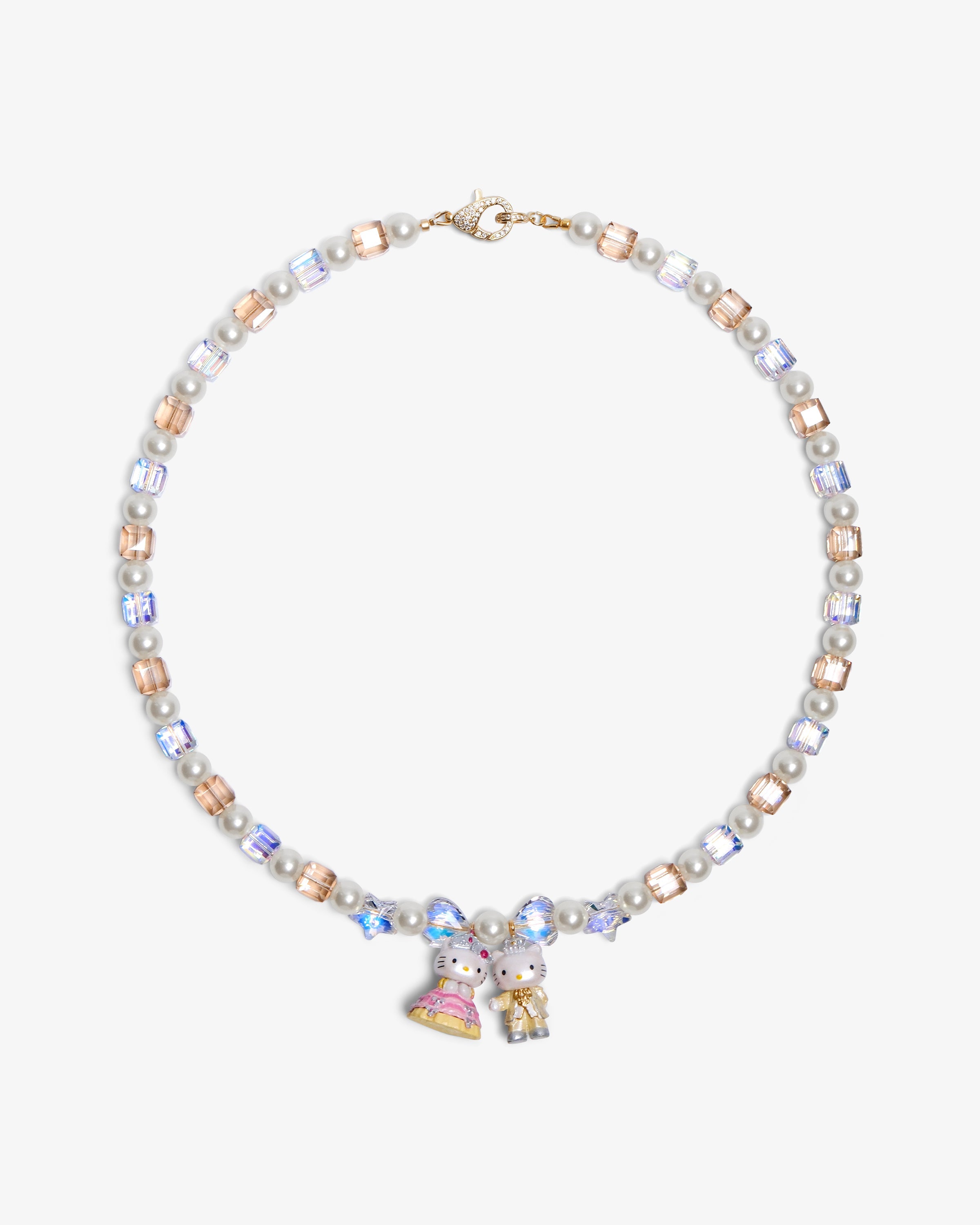 Close-up of a handmade Swarovski crystal charm necklace with crystals, pearls and princess-inspired collectible charm details
