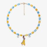 Close-up of a handmade Swarovski crystal charm necklace with crystals, pearls and princess-inspired collectible charm details