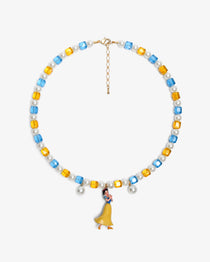 Close-up of a handmade Swarovski crystal charm necklace with crystals, pearls and princess-inspired collectible charm details