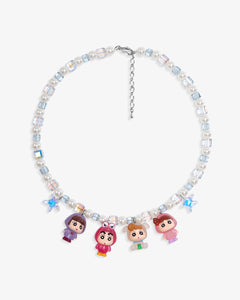 Close-up of a handmade Swarovski crystal charm necklace with crystals, pearls and retro-inspired collectible charm details